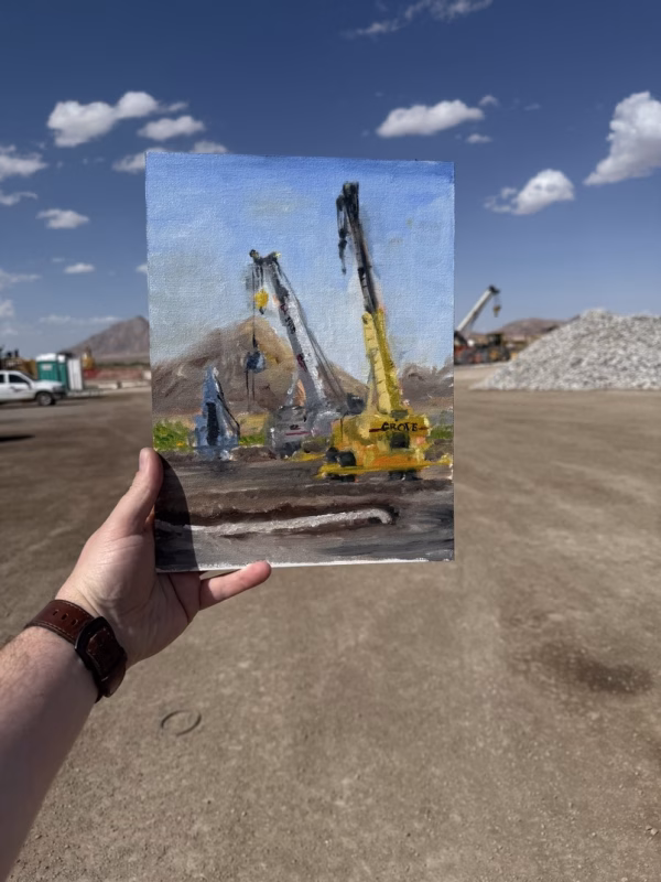 Oil painting of construction cranes in the morning light with mountains in the background.